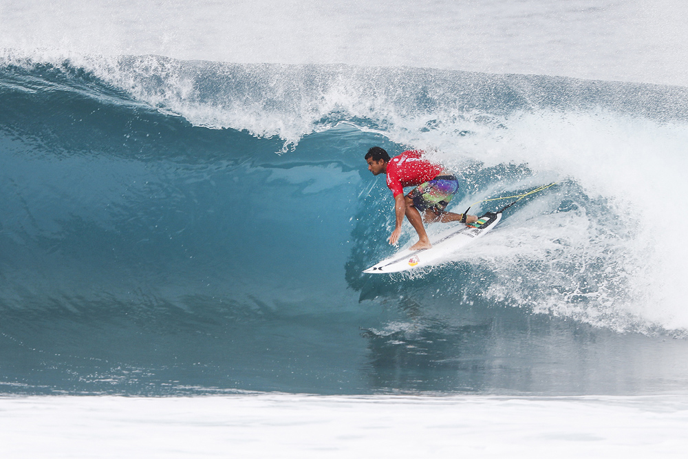 Michel Bourez surfing in the Final of the Billabong Pipe Masters at Pipeine, Oahu, Hawaii. PHOTO: © WSL / Poullenot